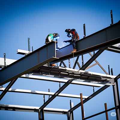 Welders on structural steel beams